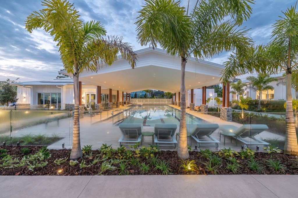 Pool and palms at Halcyon Promenade